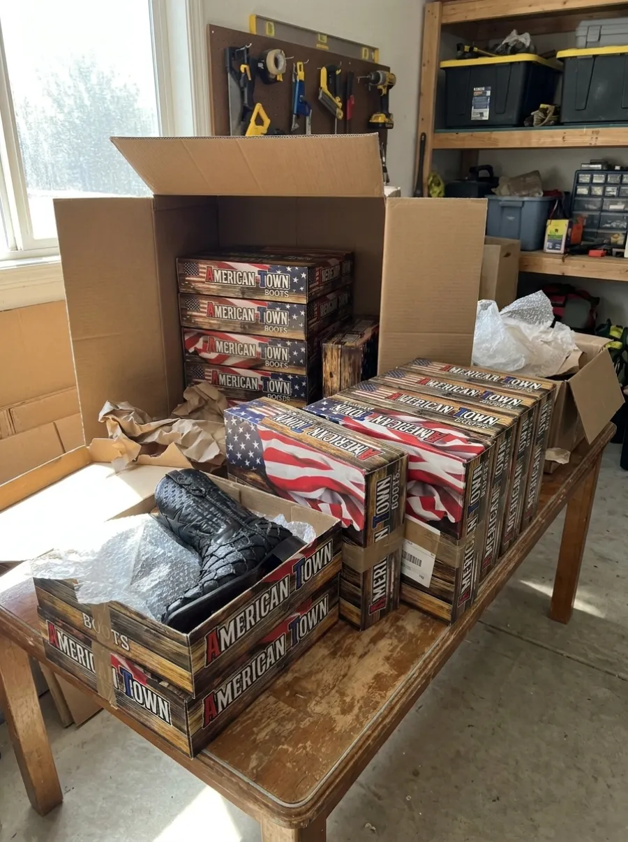 A reseller's case of Terraloma boots, ready to sell